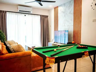 a living room with a pool table and a couch at Ipoh Manhattan Free Waterpark 3BR 8Pax Family Suite MHA306 by City Home Empire in Ipoh