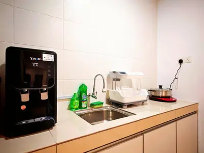 a kitchen counter with a sink and a microwave at Ipoh Manhattan Free Waterpark 3BR 8Pax Family Suite MHA306 by City Home Empire in Ipoh