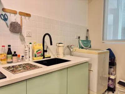 a kitchen with a sink and a counter top at D'Festivo Residence Ipoh 3Bdr by PLY Home in Ipoh
