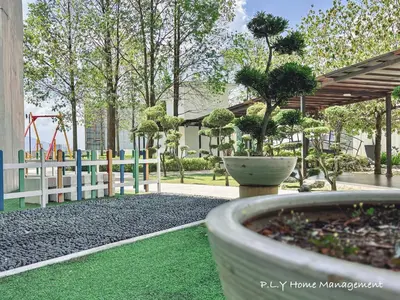 a park with a playground with a potted tree at D'Festivo Residence Ipoh 3Bdr by PLY Home in Ipoh