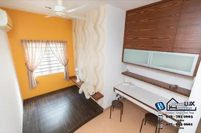 a small room with a desk and a window at Jambul Residence 15 in Gua Sai