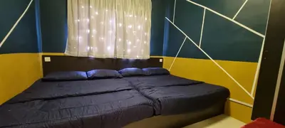 a bed in a room with a window at ZE I Cameron Jaya, Tanah Rata in Tanah Rata
