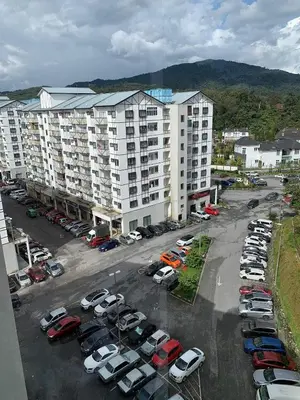 an aerial view of a parking lot with parked cars at ZE I Cameron Jaya, Tanah Rata in Tanah Rata