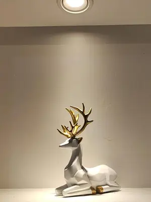 a statue of a reindeer with antlers on a table at Majestic Sanctuary Homestay Taiping with Netflix - 2 Carpark in Taiping