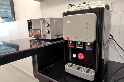 a coffee machine sitting on a counter in a room at Majestic Sanctuary Homestay Taiping with Netflix - 2 Carpark in Taiping