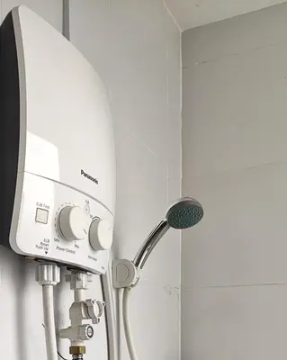 a shower tank in a bathroom next to a shower at Majestic Sanctuary Homestay Taiping with Netflix - 2 Carpark in Taiping