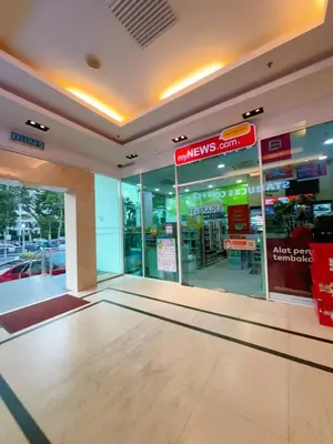 a view of a store front with a sign on the door at Mansion one premium suite-2 bedroom in George Town