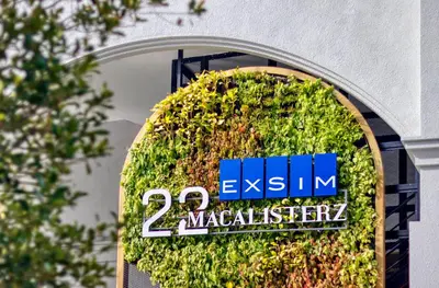 a sign on the side of a building at 22 Macalisterz Premium Suites Penang by BYON in George Town