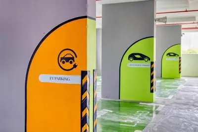 a room with three doors with a car painted on them at 22 Macalisterz Premium Suites Penang by BYON in George Town