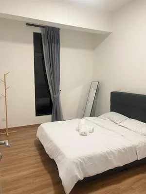 a white bed in a room with a window at The Cove 4-7 pax in Ipoh