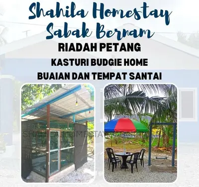 a house with a tent and a table and chairs at Shahila Homestay Sabak Bernam Islamic-friendly