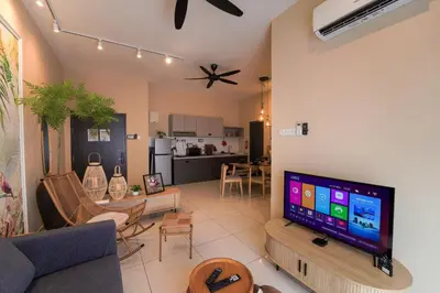 a living room with a couch and a tv at Horizon Ipoh 8Pax 3R2B - Tropical Bird's Retreat in Ipoh
