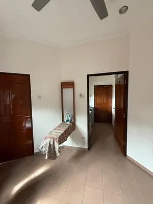 a room with a mirror and a bed in it at Majestic Bungalow Seberang Jaya in Perai