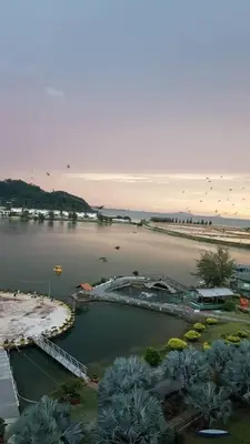 a large body of water with a marina at Homestay Marina in Lumut