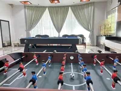 a group of toy children playing a game of soccer at Life Art Home Family Ipoh Homestay 5R4B 18pax SY28 in Ipoh