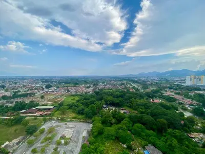 an aerial view of a city with trees and buildings at Airra Minimalist Suite-Ipoh Town in Ipoh