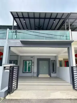 a house with an open door and a balcony at 38G Homestay in Teluk Intan