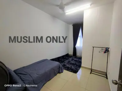 a bedroom with a bed and a sign on the wall at NH Stay, Parit Buntar Perak in Parit Buntar