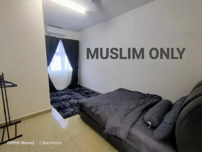 a bedroom with a bed and a sign on the wall at NH Stay, Parit Buntar Perak in Parit Buntar