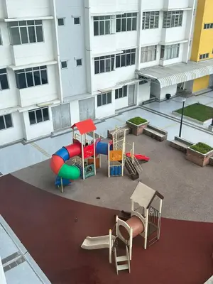 an overhead view of a playground in front of a building at Little sweet homestay in Ipoh
