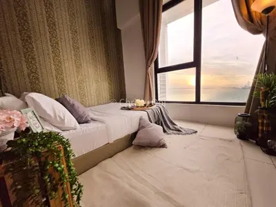 a bedroom with a bed and a large window at NEW 2BR Sunrise Gurney with Stunning Seaview \u65e0\u654c\u65e5\u51fa\u6d77\u666f\u623f in George Town