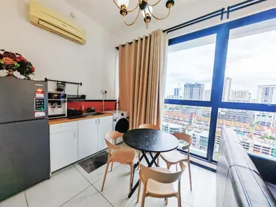 a kitchen with a table and chairs and a large window at Georgetown 2BR Luxury Condo Unbeatable Night View Infinity Pool Attractions Food Fully Equipped#148B in Bayan Lepas
