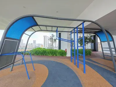 an empty bus shelter with a blue frame at Stylish city center infinity pool unbeatable night view near to attractions, food, family friendly in Jelutong