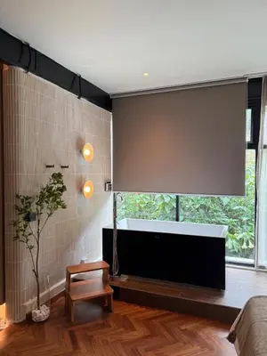 a bathroom with a large window and a bath tub at Room 11 by 10 Mentigi in Tanah Rata