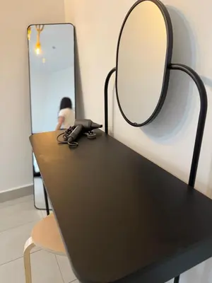 a black table with a mirror on top of it at 2 Storey Terrace 39 night market in Brinchang
