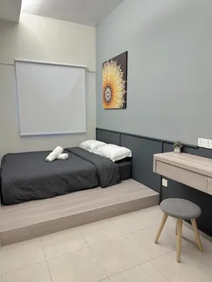 a bedroom with a bed and a blank screen at Tanah Rata Cameron Jaya cottage has plenty of hot water, a spacious living room in Tanah Rata