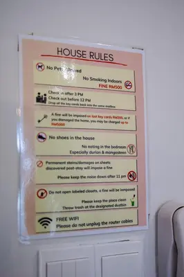 a sign that says house rules on a wall at IconicRegency #3BR #USM #Queensbay #Airport in Bayan Lepas