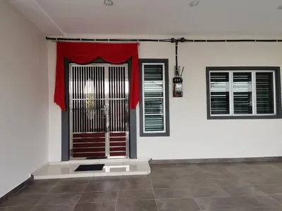 a room with a door with a red curtain at kkLee Homestay Taiping Tmn Spg Bersatu in Simpang