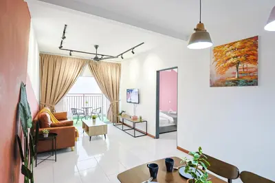 a living room with a couch and a table at Cloverhill Emerald Avenue Apartment Highland Brinchang Elegance Stay Clover Home 5-03 in Brinchang