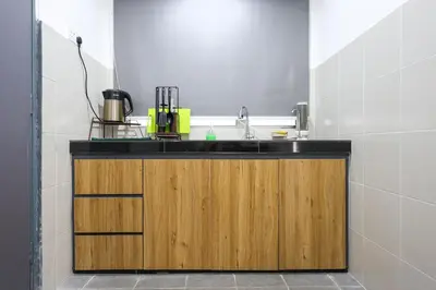 a kitchen with a sink and a counter top at Cloverhill Emerald Avenue Apartment Highland Brinchang Elegance Stay Clover Home 5-03 in Brinchang