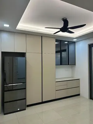 a kitchen with a ceiling fan in a room at Cozy Nook Stay Bukit Tinggi 2 in Kuang