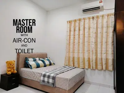 a bedroom with a master room with air con and toilet at HomeStay Sungai Petani Kedah in Sungai Petani