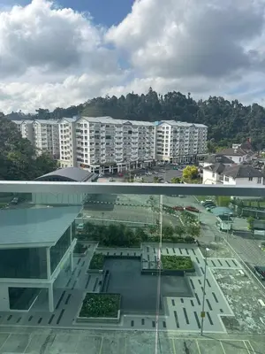 a view of a city with white buildings at Adik Aisyah cameron homestay quintet A3-7-7 in Tanah Rata