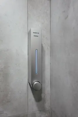 a silver object on a wall in a bathroom at Serene Nest Cameron Centrum Brinchang Clover Home A-1-15 B in Brinchang
