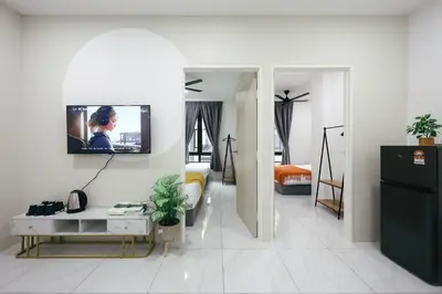 a living room with a tv on a wall at Serene Nest Cameron Centrum Brinchang Clover Home A-1-15 B in Brinchang