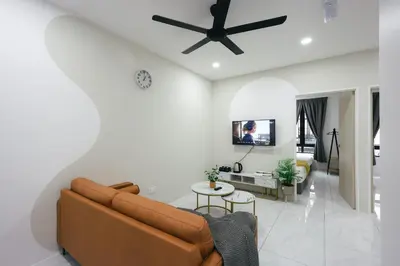 a living room with a couch and a ceiling fan at Serene Nest Cameron Centrum Brinchang Clover Home A-1-15 B in Brinchang