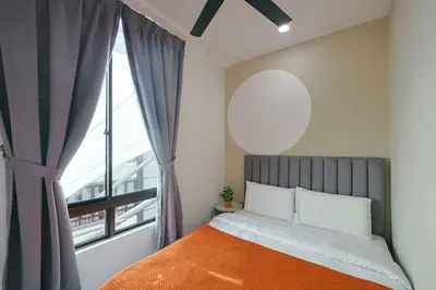 a bedroom with a bed and a large window at Cameron Centrum Brinchang ChillSuites Peaceful Escape Clover Home A-3-15B in Brinchang