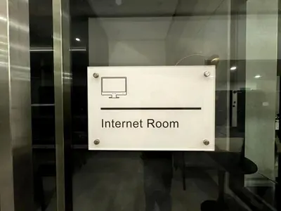 a sign for an internet room on a glass door at Cozy Sea & City View Penang, 3BR-10PAX b30 in George Town