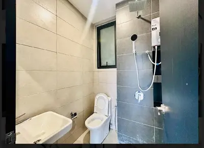 a bathroom with a toilet and a sink at 3BR-Apartment-Netflix,Cozy,Peaceful FamilyHomes b30 in George Town
