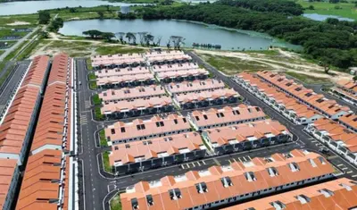 an overhead view of a building complex with red roofs at The Silverlakes Homestay in Batu Gajah