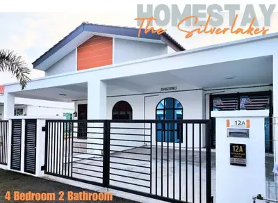 a bedroom bathroom house with a giveaway gate at The Silverlakes Homestay in Batu Gajah