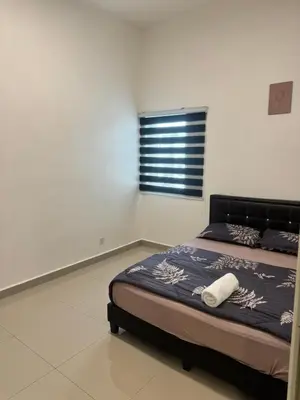 a bedroom with a bed and a window at AYAAN FIFA HOME at Quintet Private Parking in Tanah Rata