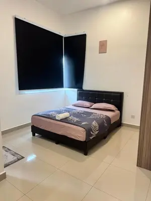 a bedroom with a bed and a large window at AYAAN FIFA HOME at Quintet Private Parking in Tanah Rata
