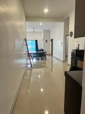 a kitchen and dining room with a table and chairs at AYAAN FIFA HOME at Quintet Private Parking in Tanah Rata