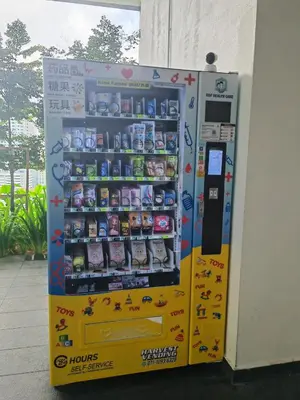 a vending machine with food and drinks in a building at Urban Suite in George Town