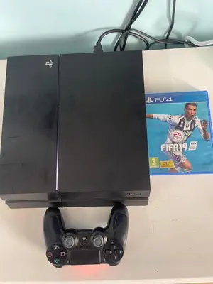 a black computer monitor with a video game controller at AYAAN Fifa Game HOMESTAY At Tanah Rata with Wifi in Tanah Rata